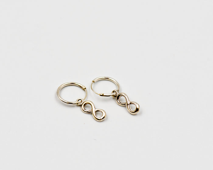 102 Earring Silver Huggy with infinity charm.