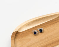 066 Earrings Silver and Cubic dark blue with Zirconia stones around it