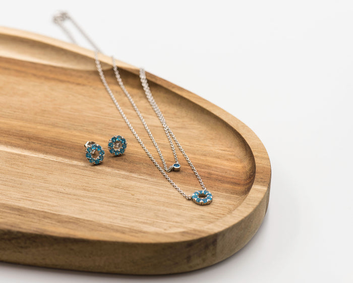 130 Elegant silver round earrings and chain set, featuring a combination round pendant with June apatite blue stones.