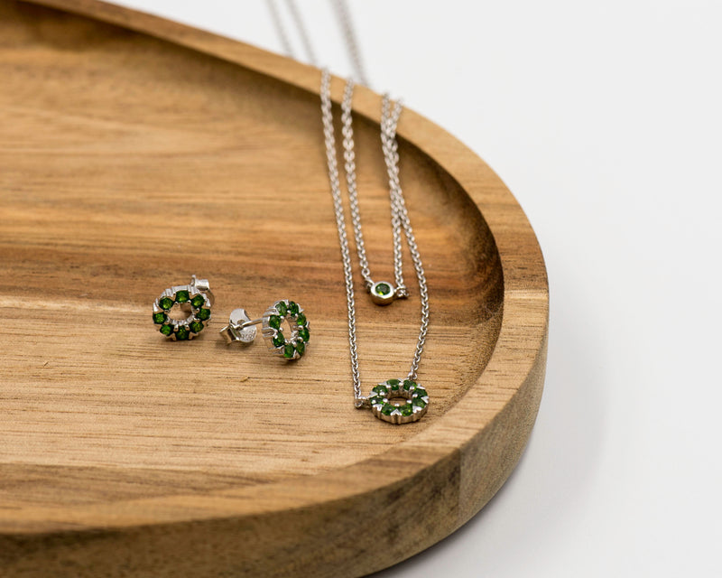 129 Elegant silver round earrings and chain set, featuring a combination round pendant with May emerald stones.