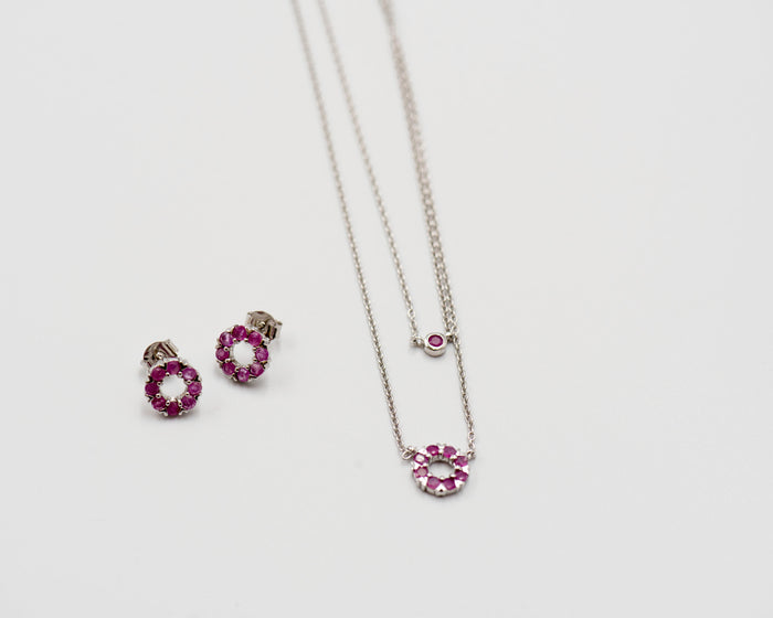 134 Elegant silver round earrings and chain set, featuring a combination round pendant with October rhodolite stones.