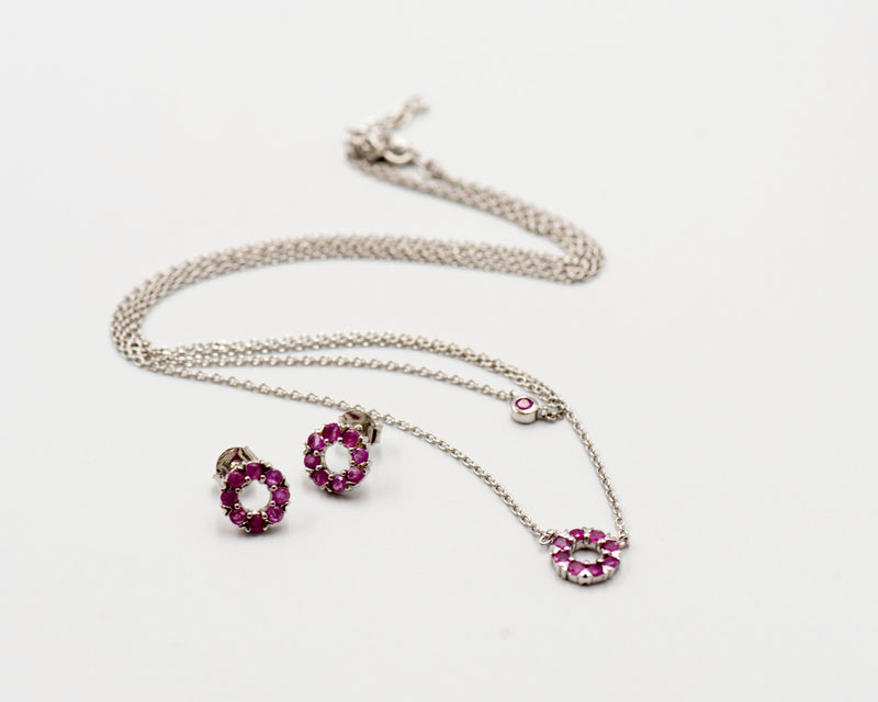 134 Elegant silver round earrings and chain set, featuring a combination round pendant with October rhodolite stones.