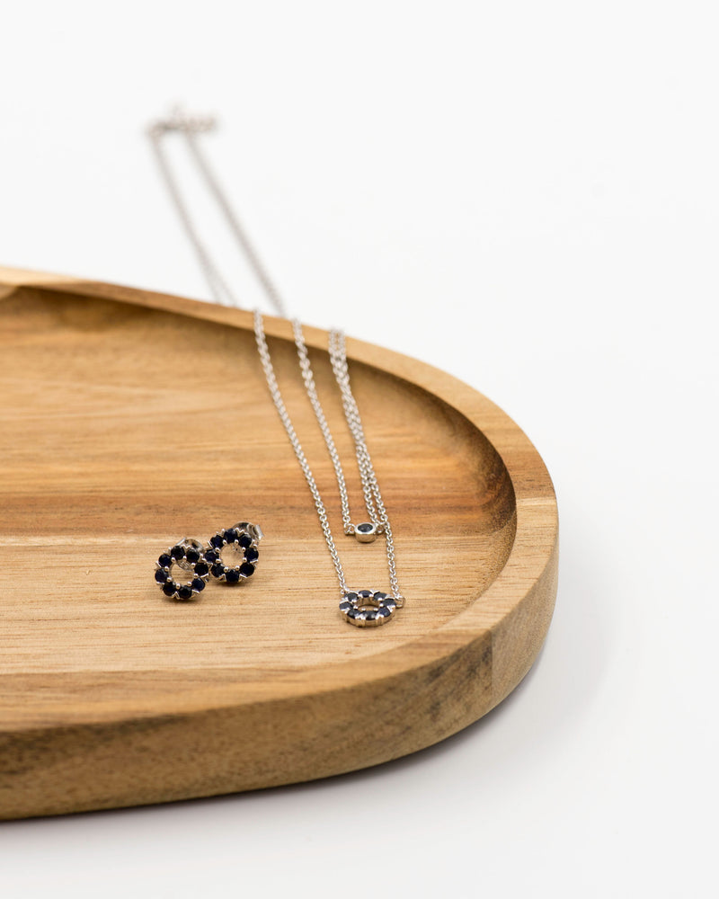 138 Elegant silver round earrings and chain set, featuring a combination round pendant with black spinel stones.