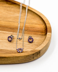 126 Set Chain and Earring Elegant silver round earrings and chain set, featuring a combination round pendant with February amethyst stones.