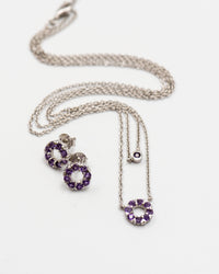 126 Set Chain and Earring Elegant silver round earrings and chain set, featuring a combination round pendant with February amethyst stones.