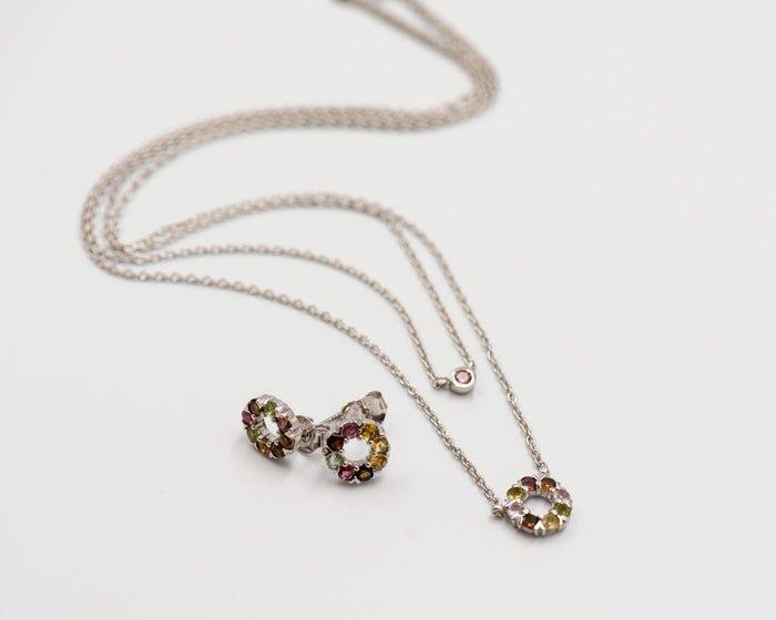 137 Elegant silver round earrings and chain set, featuring a combination round pendant with multi-colored tourmaline stones.