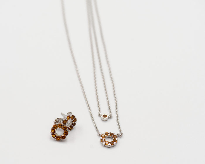 135 Elegant silver round earrings and chain set, featuring a combination round pendant with November citrine stones.