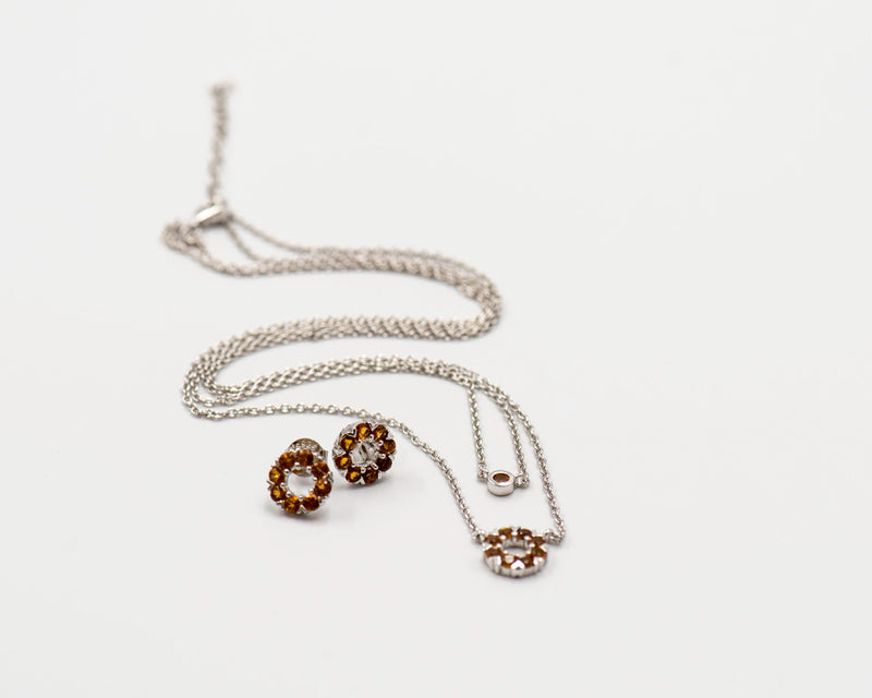 135 Elegant silver round earrings and chain set, featuring a combination round pendant with November citrine stones.