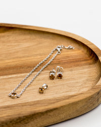 150 Elegant silver 3-piece set, featuring round earrings with 50mm November citrine stones, a matching pendant, and a bracelet with citrine stones.