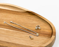 149 Elegant silver 3-piece set, featuring round earrings with 50mm October opal stones, a matching pendant, and a bracelet with opal stones.