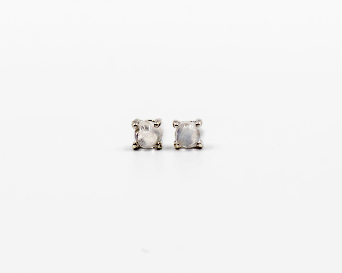 115 Earring Elegant silver 3mm stud earrings featuring a Rainbow April moonstone birthstone.