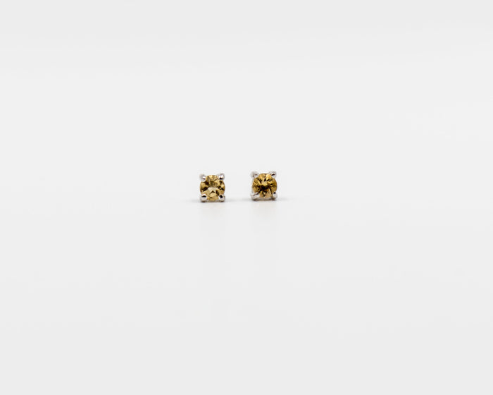 122 Earring Elegant silver 3mm stud earrings featuring a November citrine birthstone.