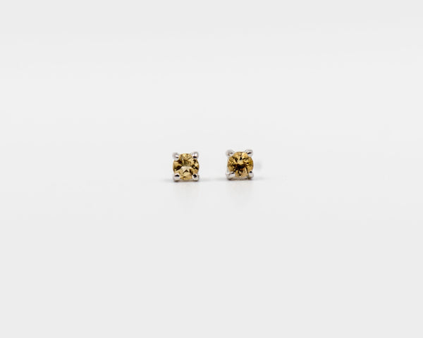 122 Earring Elegant silver 3mm stud earrings featuring a November citrine birthstone.