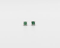 116 Earring Elegant silver 3mm stud earrings featuring a May emerald birthstone.