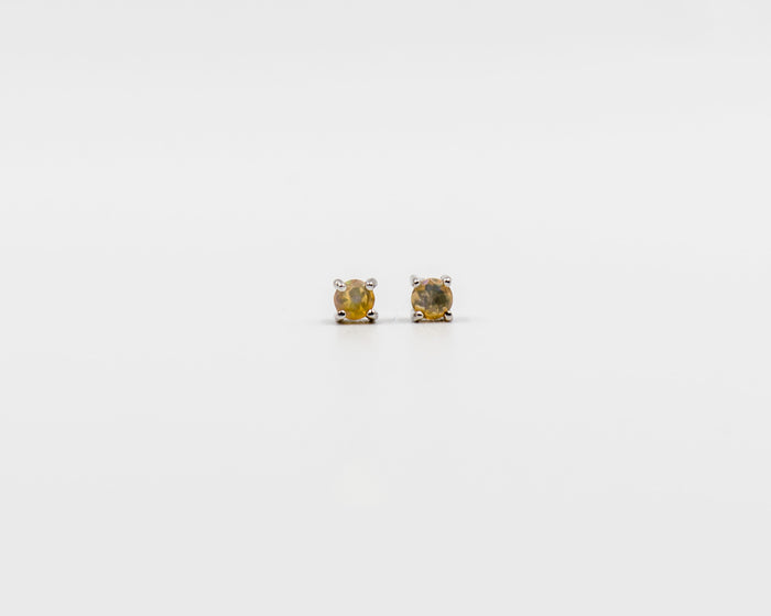 124 Earring Elegant silver 3mm stud earrings featuring yellowish opal.