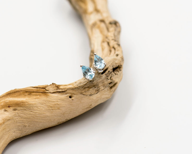 055 Earrings 8X5mm Blue Topaz Pear shape studs